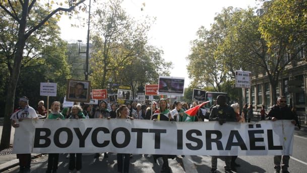 People take part in an anti-Israeli demonstration in Paris
