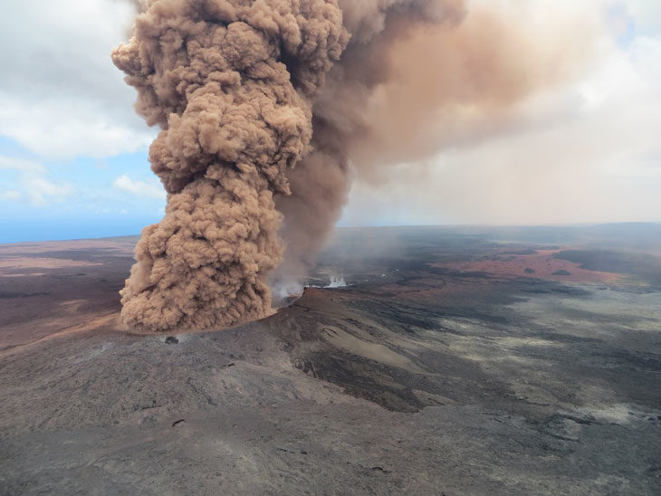 Click to enlarge TOXIC CLOUD A plume of ash burst from Kilauea