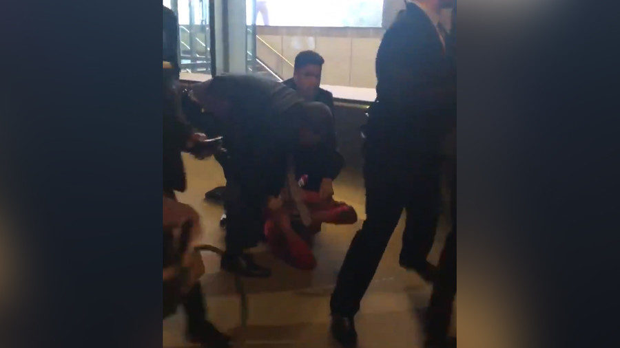Police tackling teenager