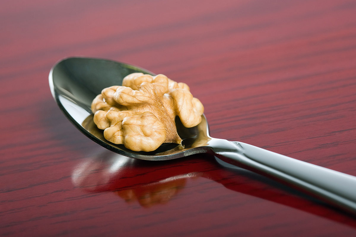 Click to enlarge walnut on spoon