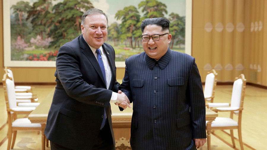North Korean leader Kim Jong Un shakes hands with US Secretary of State Mike Pompeo