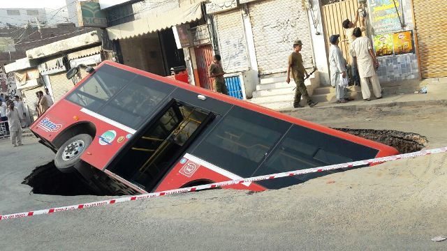 BUS IN SINKHOLE