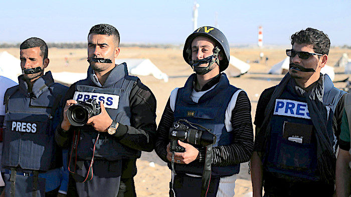 Click to enlarge Journalists protest