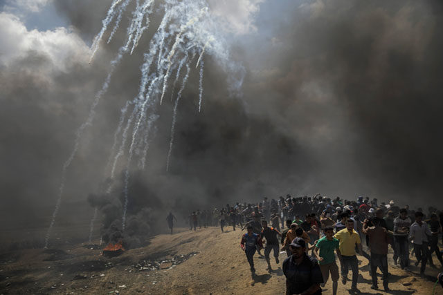 Gaza City protest tear gas