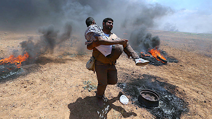 Click to enlarge Gaza father child