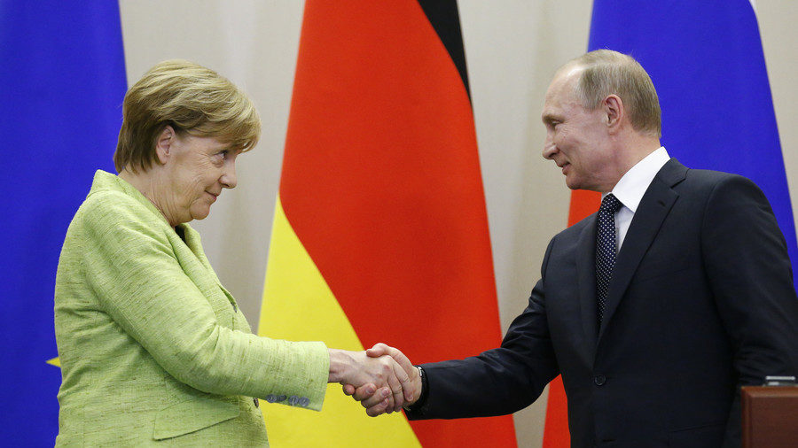putin merkel handshake