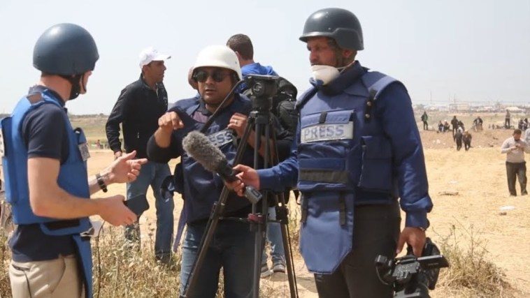 Click to enlarge reporters Gaza protest
