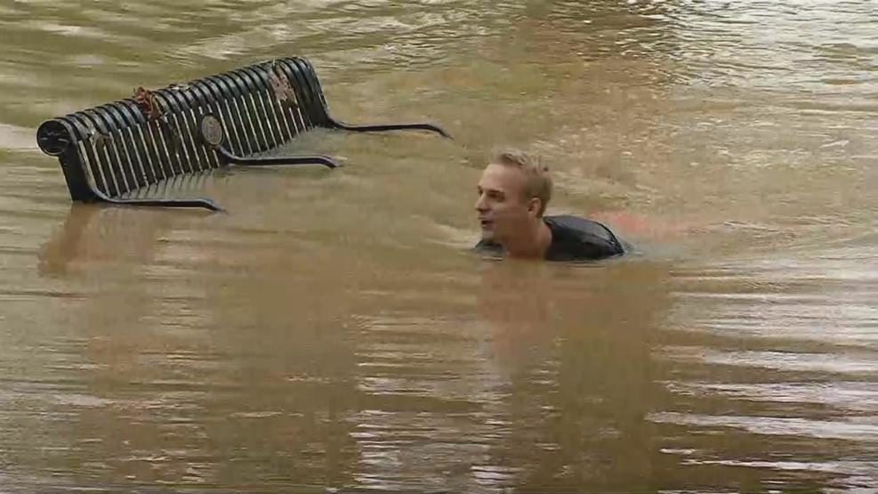 NBC4 caught one resident taking a dip in the flood water!