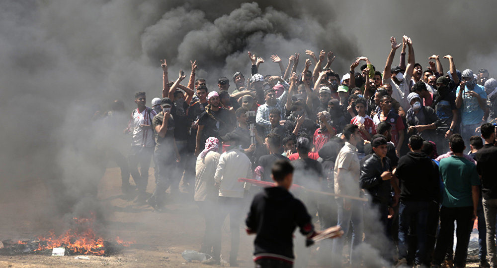 Click to enlarge Palestinian demonstrators
