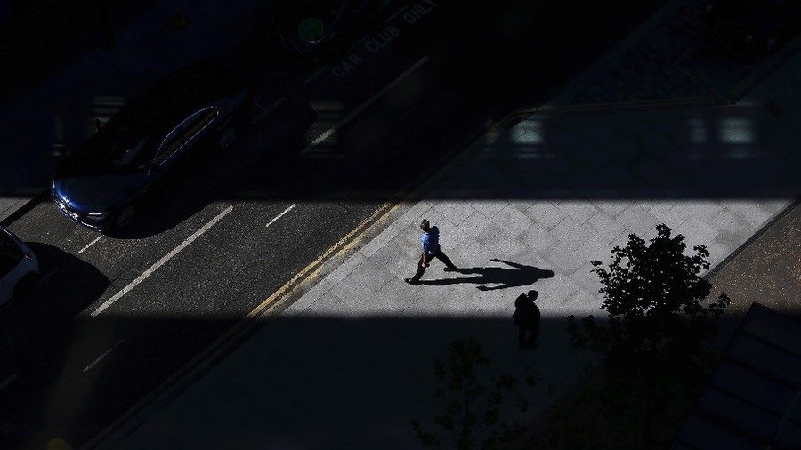 Click to enlarge man walking shadow