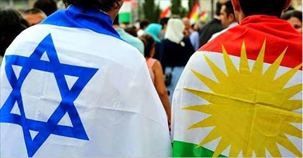 Israeli and Kurdish flags on people's back