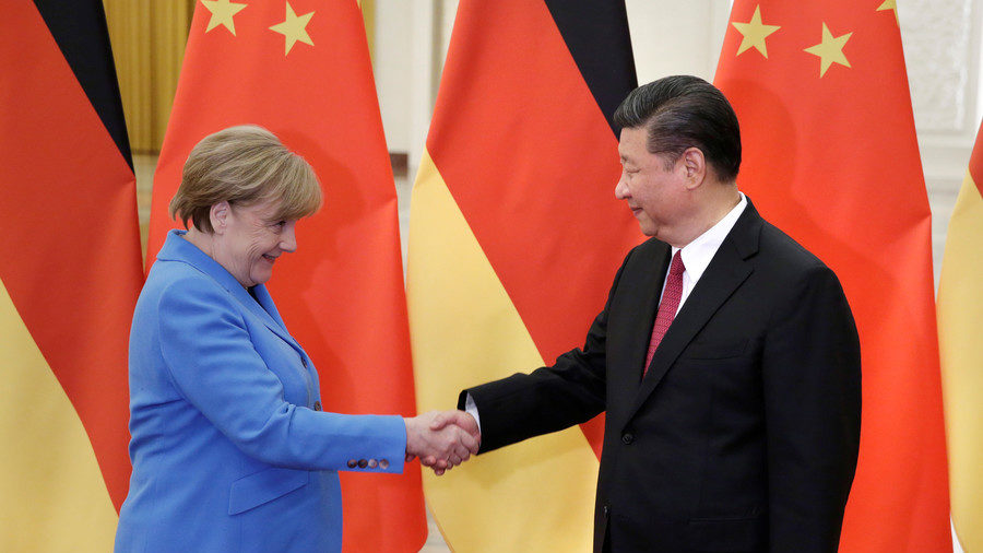 China's President Xi Jinping (R) meets German Chancellor Angela Merkel at the Great Hall of the People in Beijing, China, May 24, 2018.