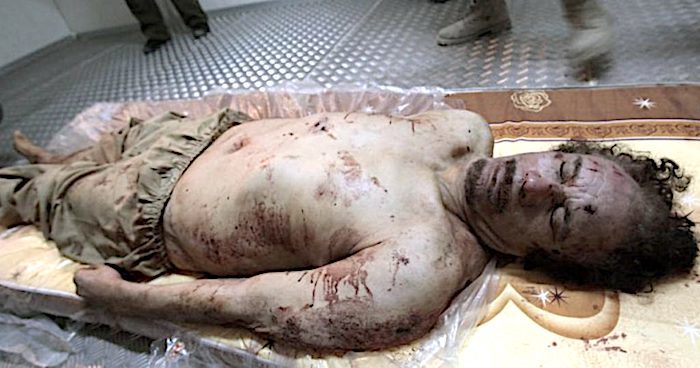 Click to enlarge Muammar Gaddafi