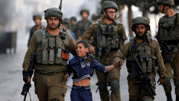Click to enlarge Israeli soldiers Palestinian child