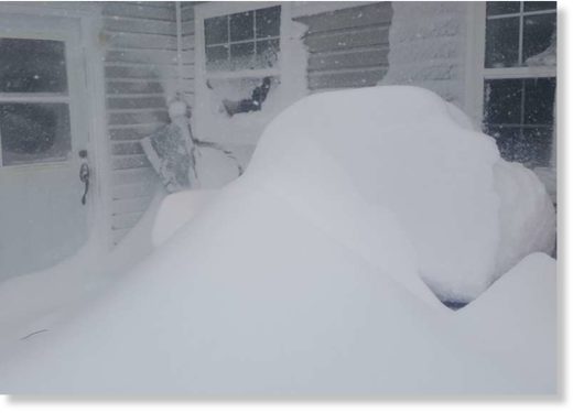 Drifting snow is piled high on CBC producer David Newell's deck in Gander