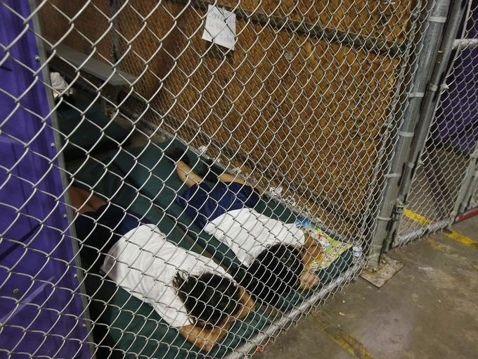 Click to enlarge caged migrant children obama