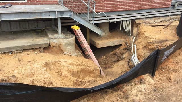 massive sinkhole at Oxford High School.