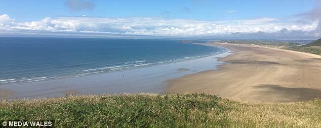The beautiful beach at Rhossili was voted the best in Europe by Suitcase magazine last year