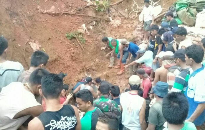 Illegal gold mine which residents were working on collapsed during rain.