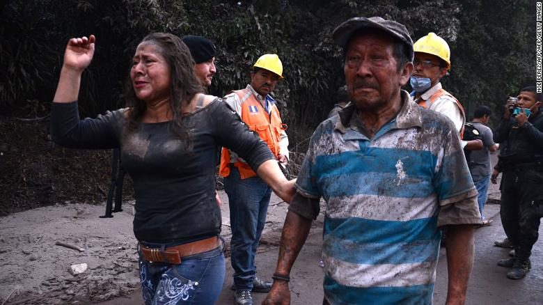Click to enlarge Residents flee El Rodeo village after the Fuego volcano erupted