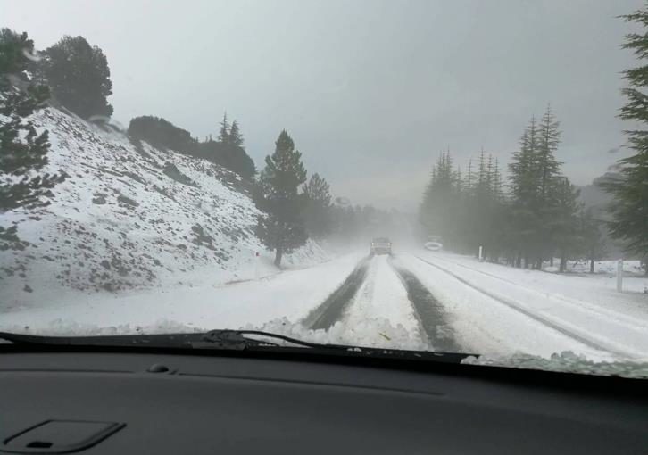 heavy hail in the Troodos Mountains temporarily turning the landscape and road network white.