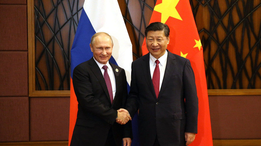 Click to enlarge Putin and Xi Jinping
