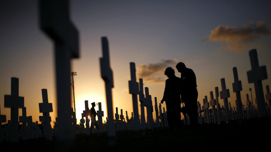 mourners at cemetery
