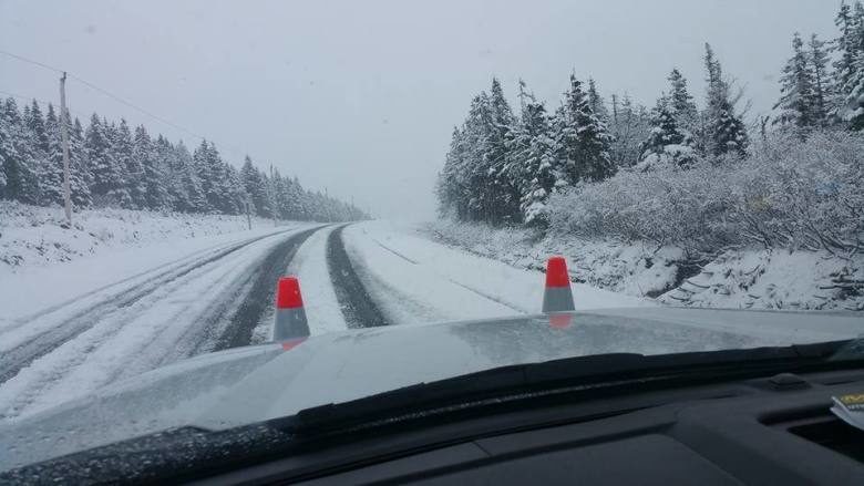 Click to enlarge Snow on the road near Cheticamp.