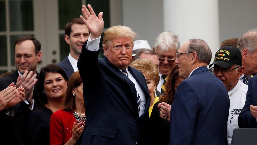 Click to enlarge Trump waving