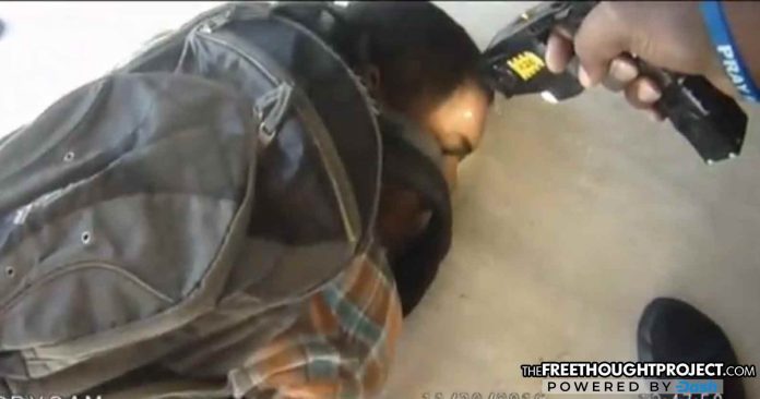 Click to enlarge cop tasers kid
