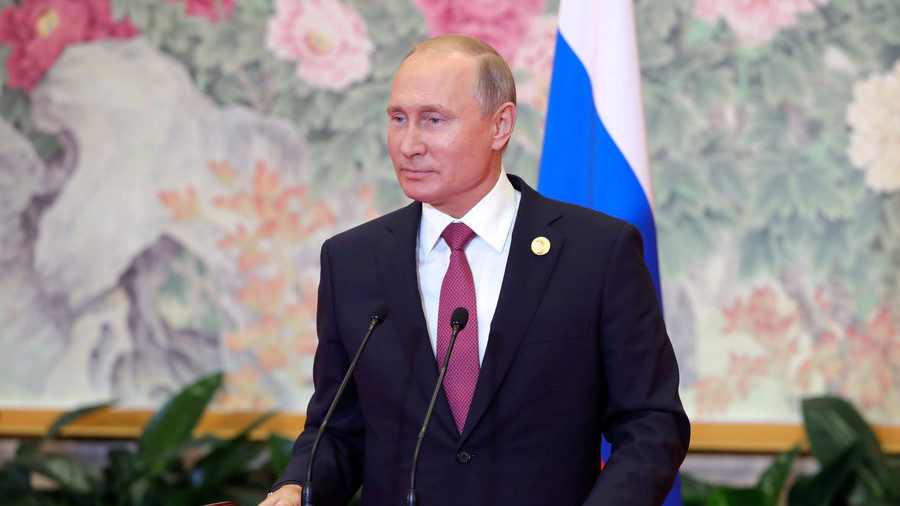 Putin attends a news conference on the results of the SCO summit in China