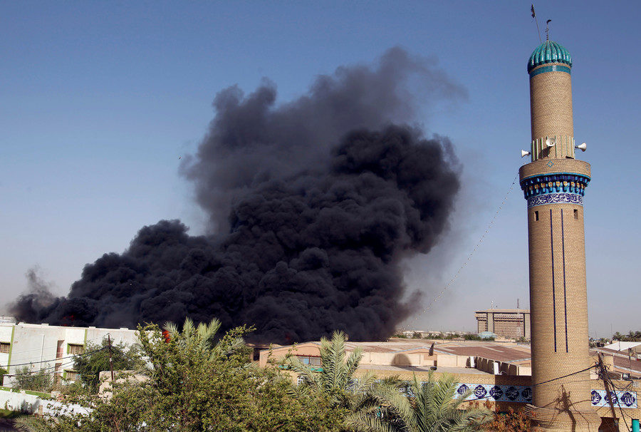 Smoke rises from the storage site