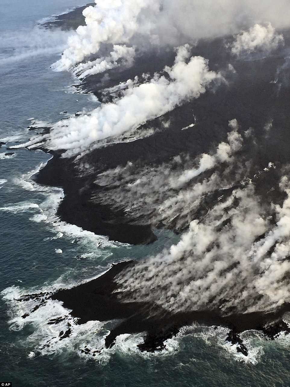 Hawaii volcano eruption- lava flow into pacific