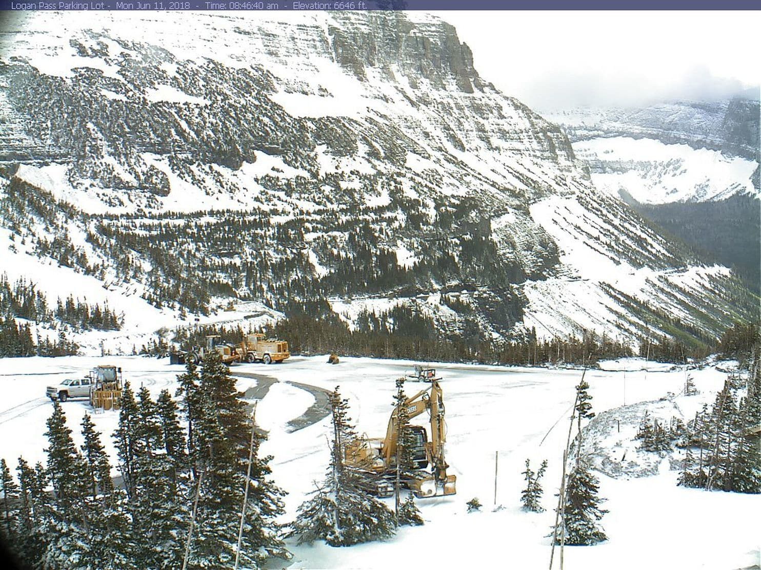 Click to enlarge The parking lot at Logan Pass at Glacier National Park in Montana.