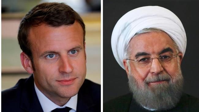 Iranian President Hassan Rouhani (R) and his French counterpart, Emmanuel Macron