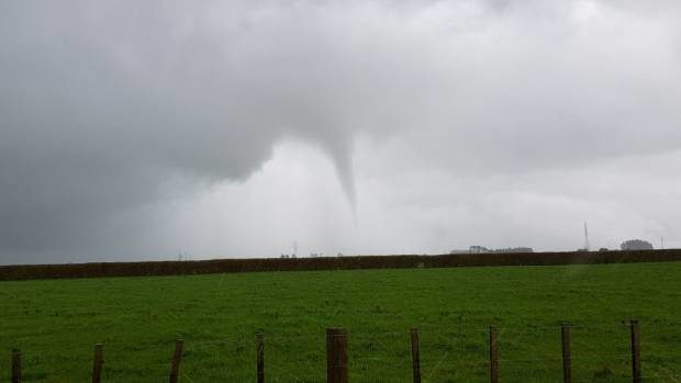 A twister tears through Taranaki in this picture taken by Geoff Christophers.