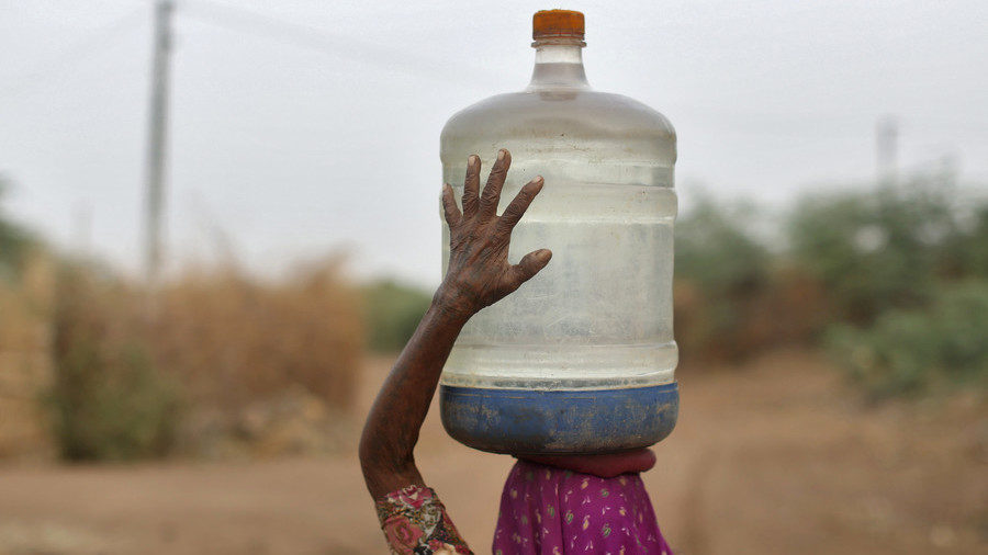 Click to enlarge Carrying water jug