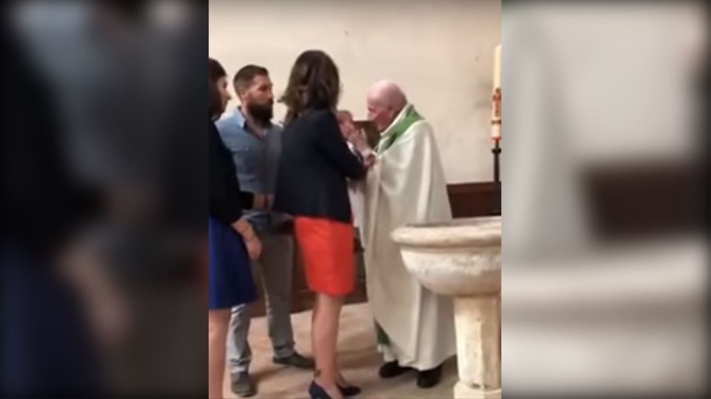 French priest slaps baby during baptism