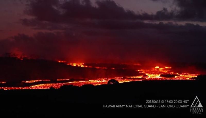 Rivers of lava flow from fissure no. 8 toward the sea off Kapoho.