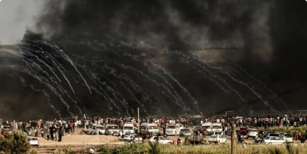 Click to enlarge Israeli forces fire tear gas at Palestinian demonstrators