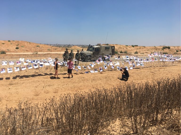 israel activists pictures gaza killed fence