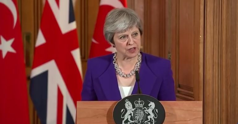 Click to enlarge Theresa May