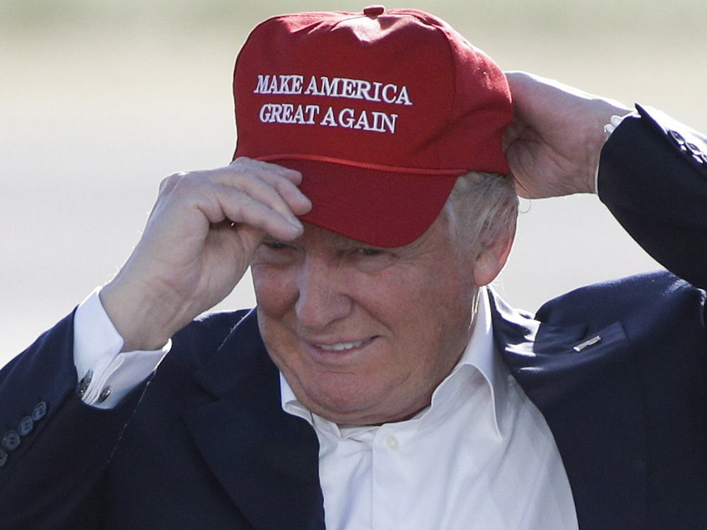 In this June 1, 2016, file photo, then Republican presidential candidate Donald Trump wears his 