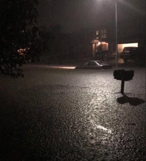 Click to enlarge Flooding in Des Moines, Iowa, on Saturday night.