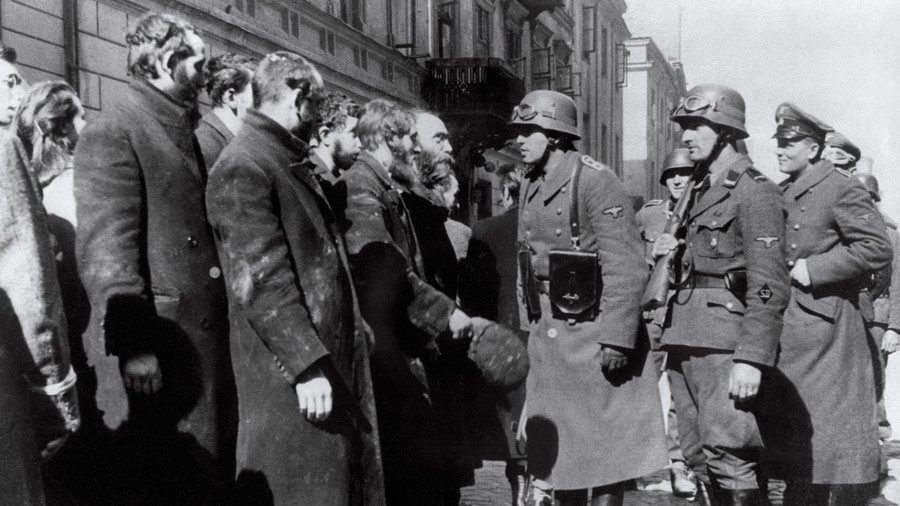 Click to enlarge Nazi German soldiers question Jews after the Warsaw Ghetto Uprising, 1943