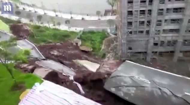 No injuries or deaths were reported as a result of the road collapse (pictured), which occurred just before 7am on Sunday