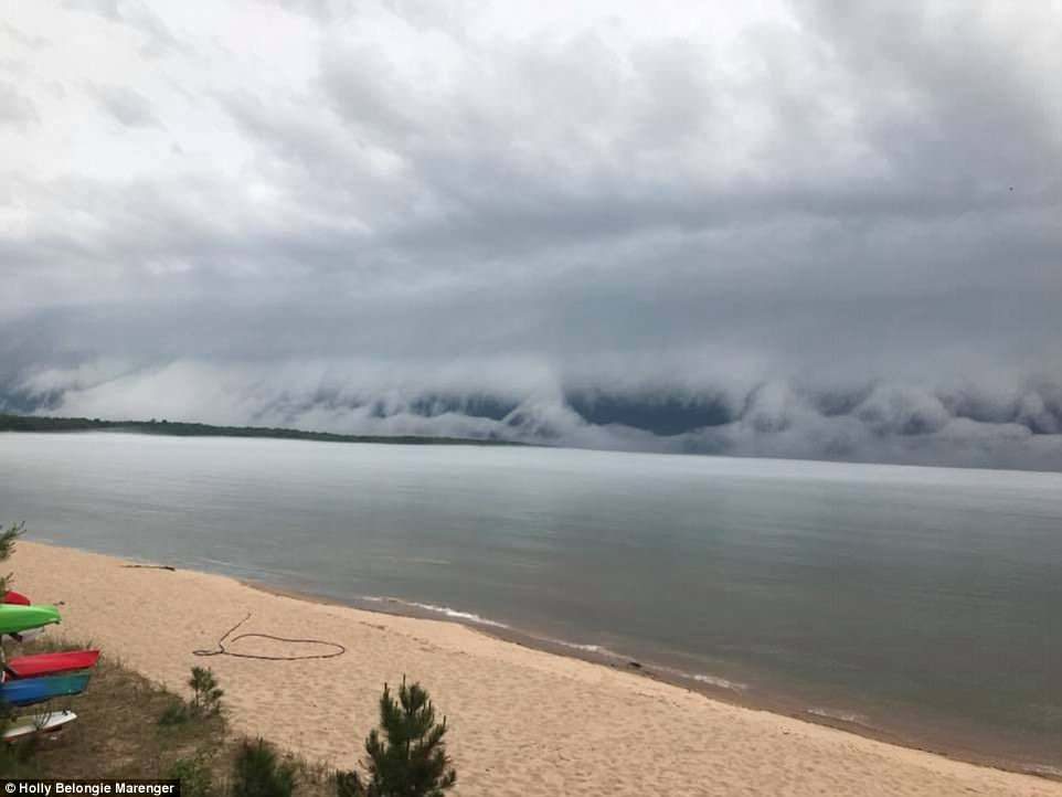 It may resemble an apocalyptic scene or a tsunami, but meteorologists believe the unusual spectacle was actually a 'shelf cloud'