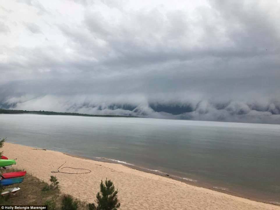 Click to enlarge It may resemble an apocalyptic scene or a tsunami, but meteorologists believe the unusual spectacle was actually a 'shelf cloud'