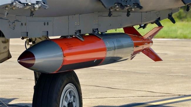 Click to enlarge A B61-12 nuclear bomb placed on a US Air Force fighter jet