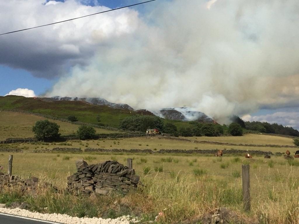 Click to enlarge Another moor fire scorches through land parched by heatwave in Bradford, UK